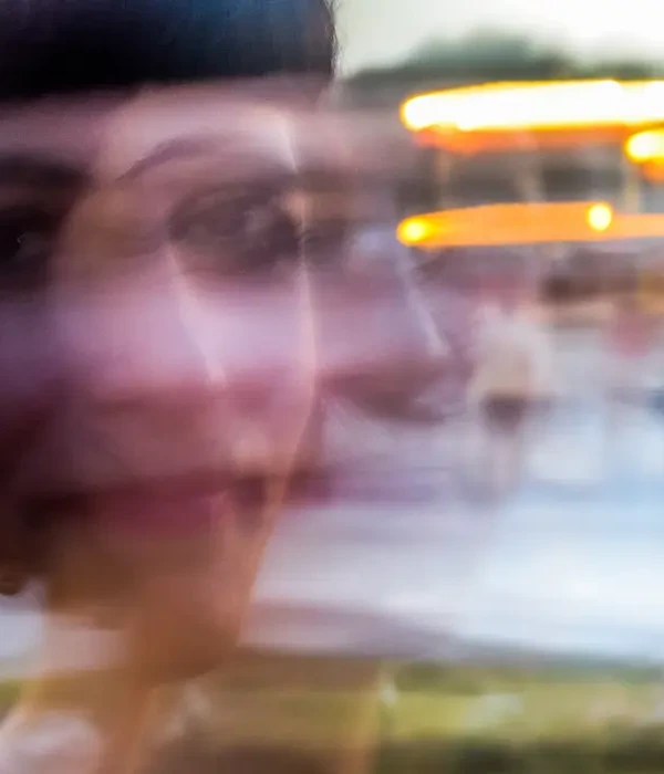 steps together alcohol blurred motion woman standing against illuminated lights sunset