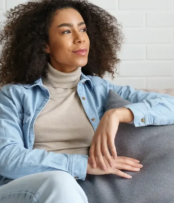 steps together blue happy relaxed african woman lounge comfortable sofa dreaming