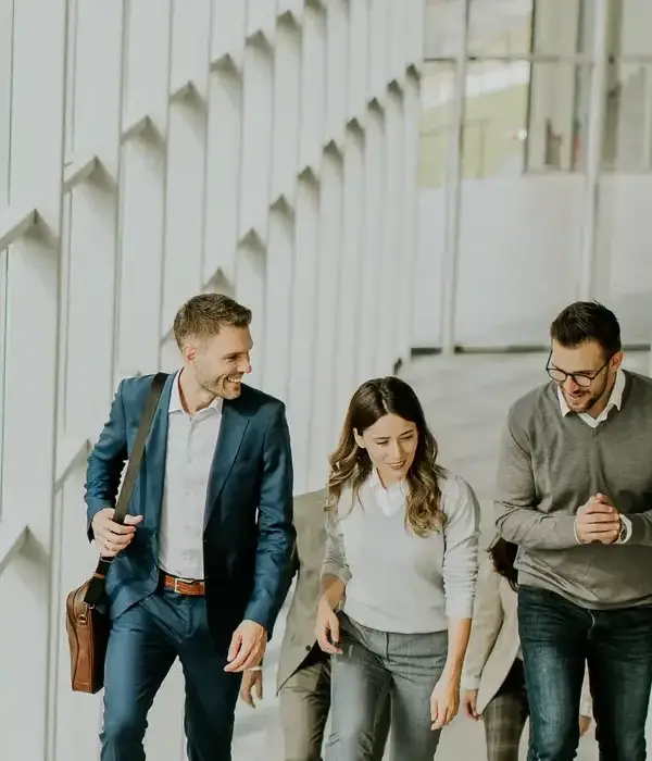 steps together executive group corporate business professionals climbing stairs office corridor