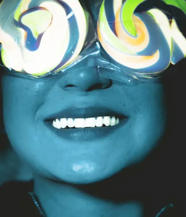 steps together face close up woman holding lollipops while lying bed