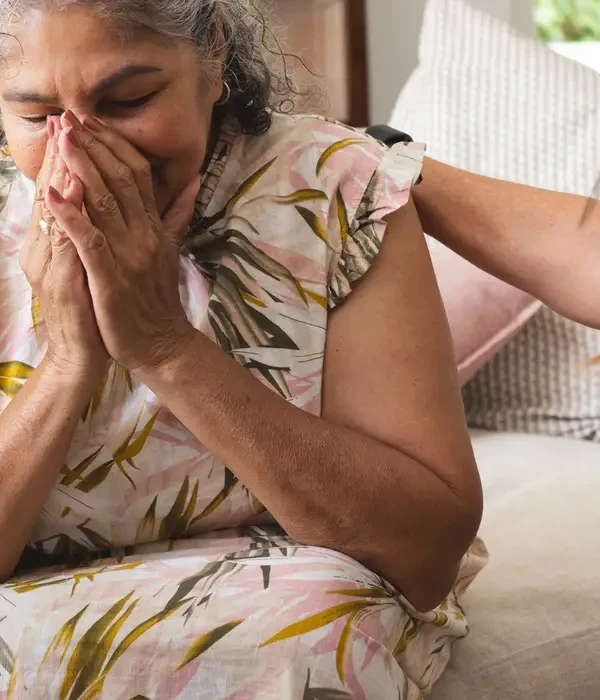 steps together face therapy diverse senior female friends comforting crying biracial woman
