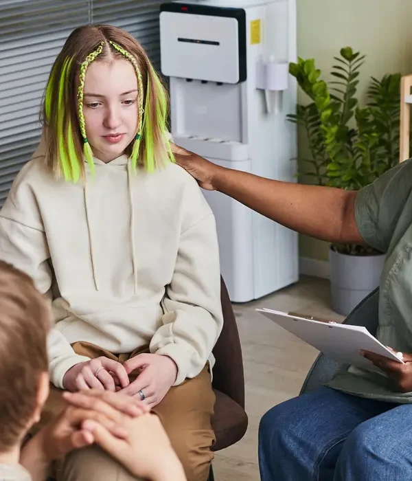 steps together green therapy group teenagers sitting chairs talking their problems psychologist