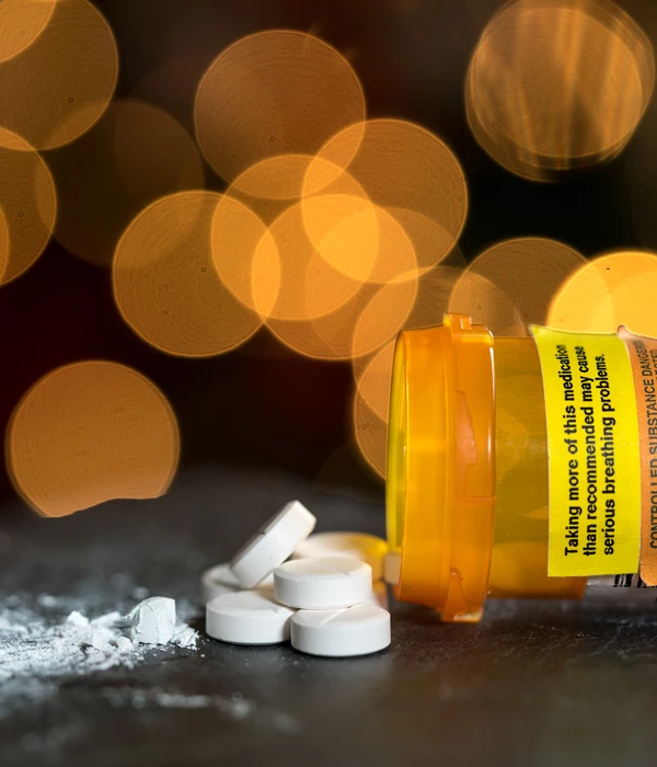 steps together orange white opioid macro oxycodone opioid tablets