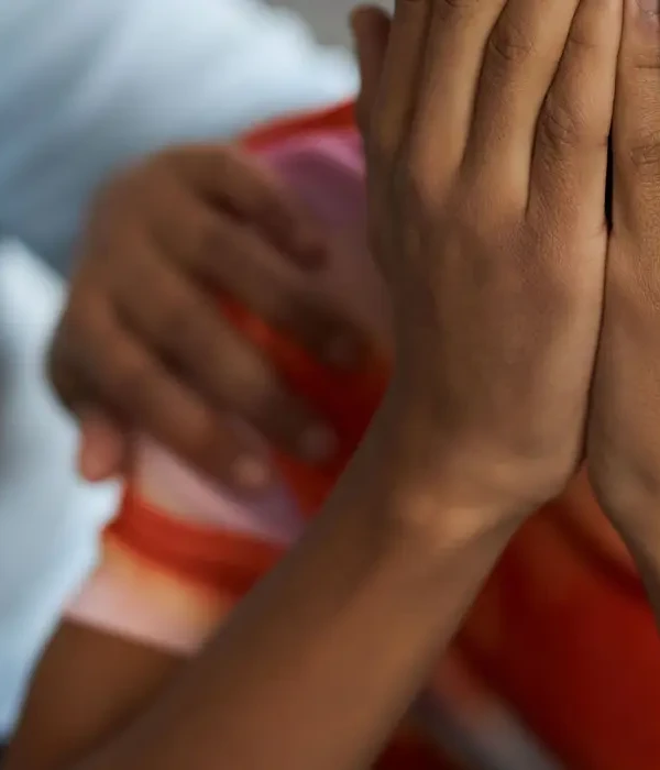 steps together therapy closeup upset teenage boy covering his face with