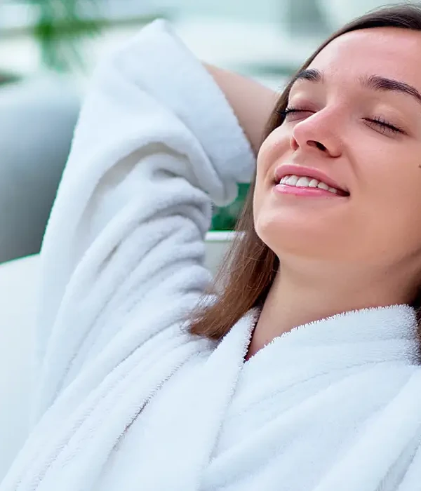 steps together white serene calm woman wearing white bathrobe with closed